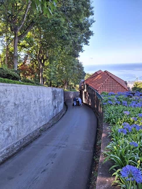 Funchal: Private Cable Car, Toboggan, and Skywalk Tour - Getting up to Monte by cable car, with the views already in motion