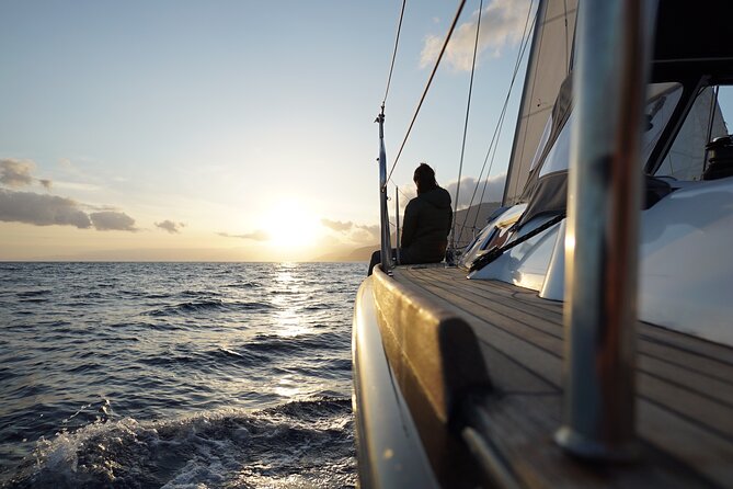 Funchal: Sunset Sailing Private Tour - Finding the blue boat with the Happy Hour Madeira flag