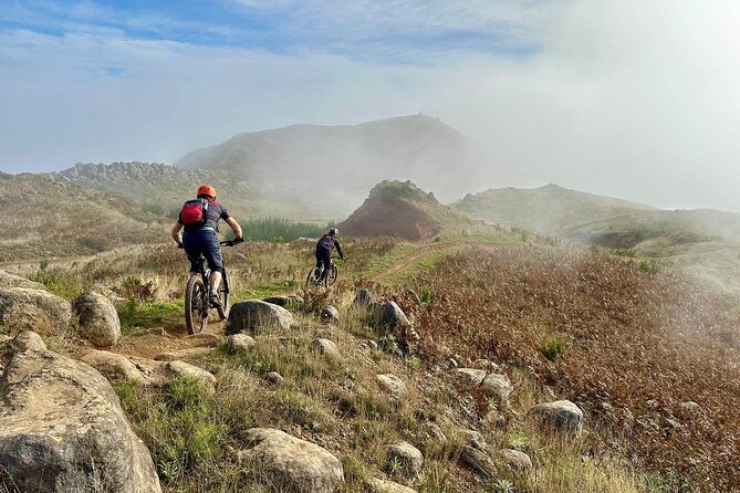 Madeira Island Guided Mountain Biking Adventure - The bikes and guide: full-suspension control, plus coaching when it gets messy