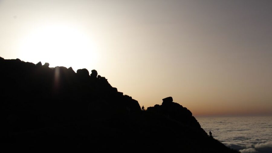 Madeira: Pico do Areeiro Sunrise Tour - Faial toward Machico: northeast cliffs and landmark time