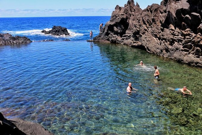 Porto Moniz 4WD Jeep Full Day Tour - Seixal and the ocean meeting steep terrain