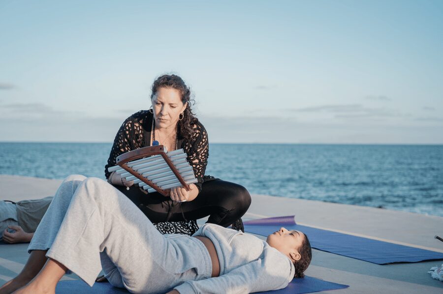 Private Yoga & Sound Bath by the Ocean - Emilie Mangoni and the teaching style you can expect