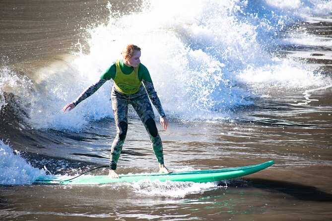 Surfing Lessons in Madeira - Post-session stretching, leaving feeling ready to travel
